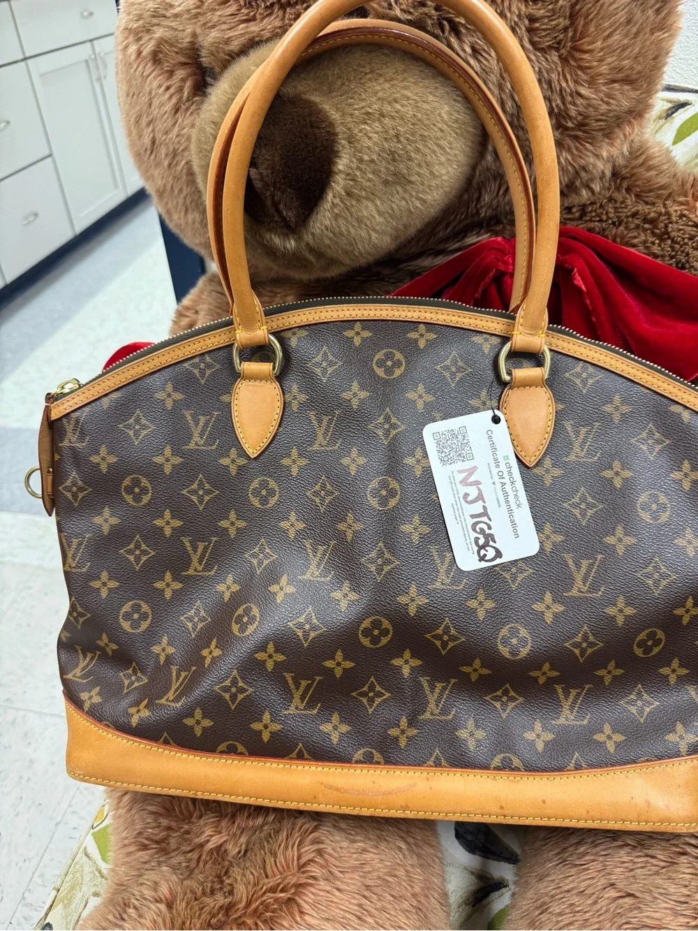Louis Vuitton Monogram Lockit Canvas Handbag with COA